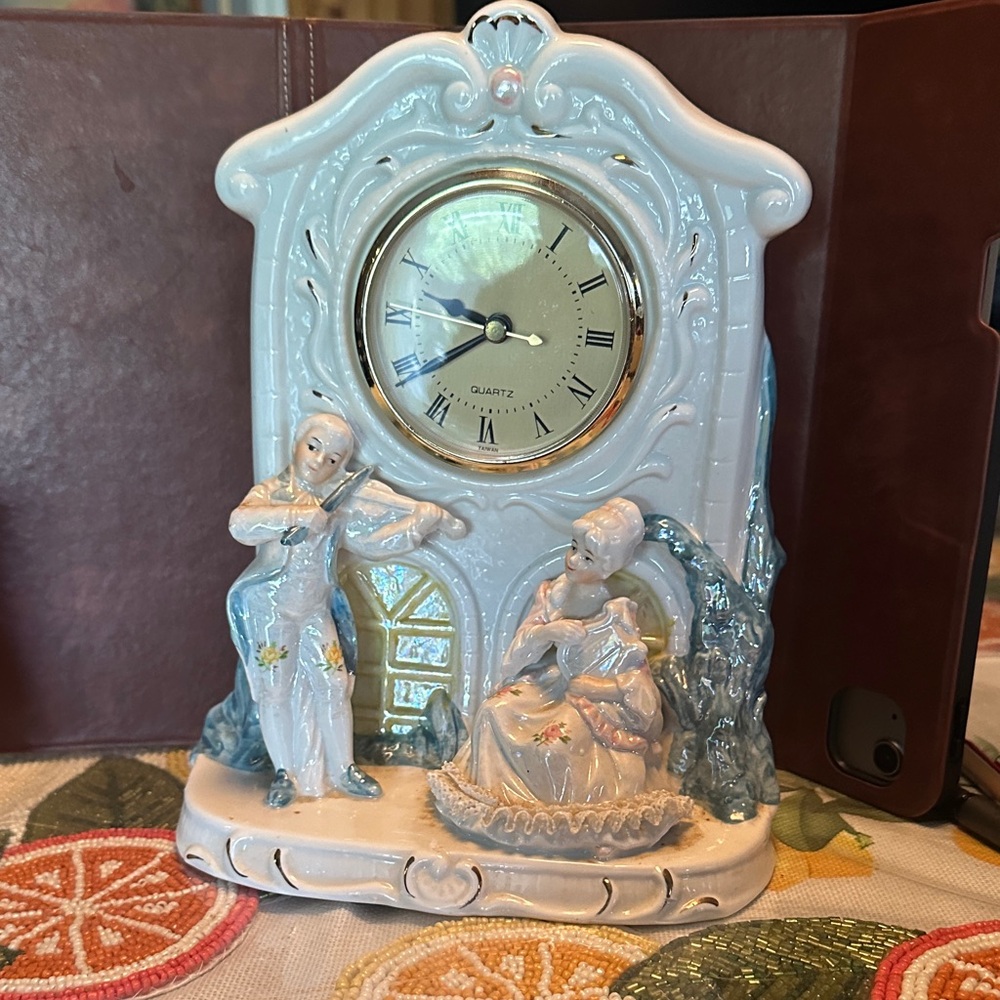 Charming White and Blue Ceramic Clock with Figurines